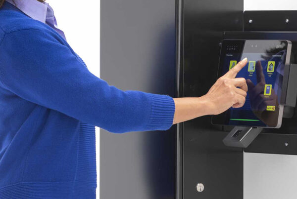 Woman using HandyTrac key control system